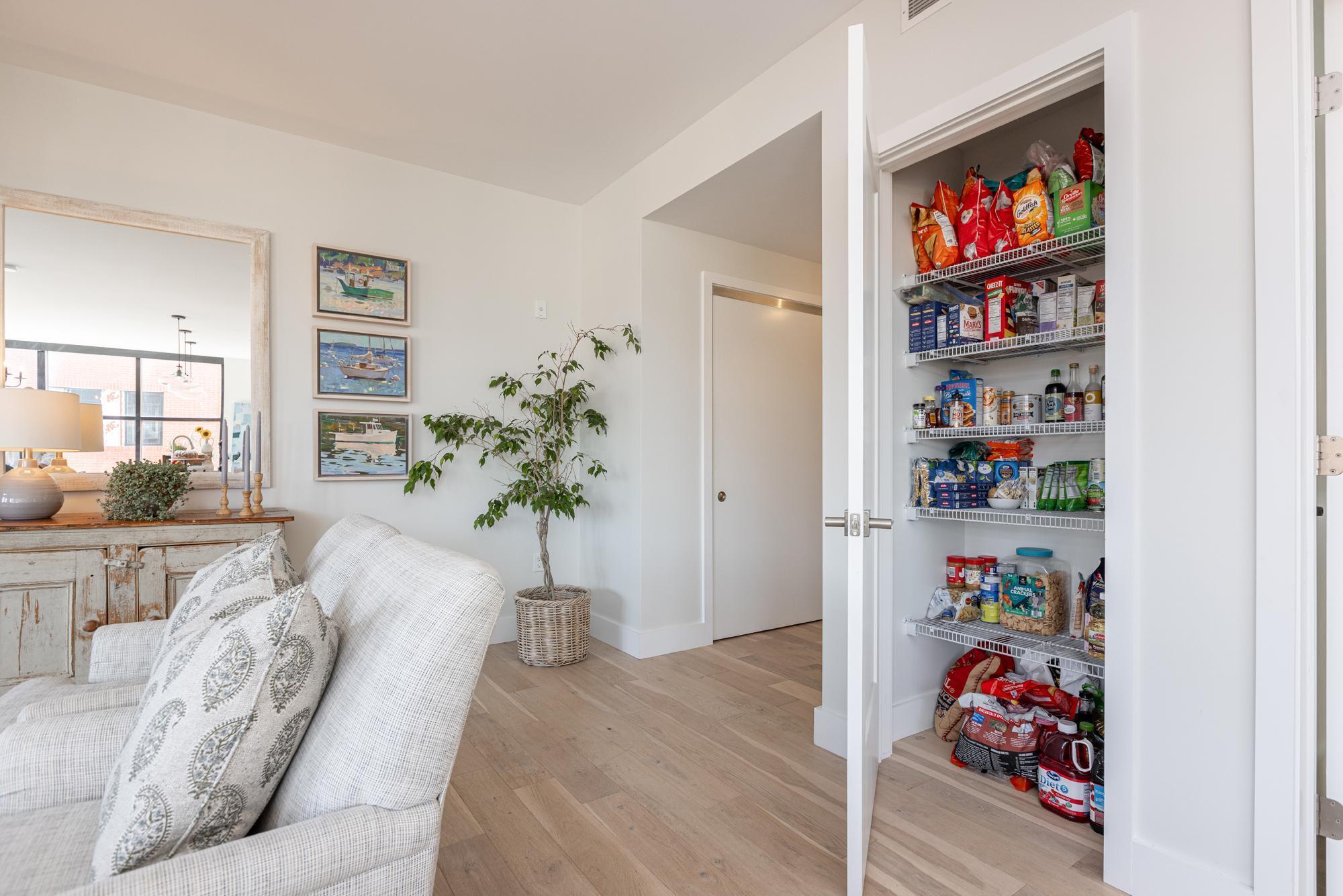Huge closet pantry and secondary pantry to the right of the fridge. - 383 Commercial St