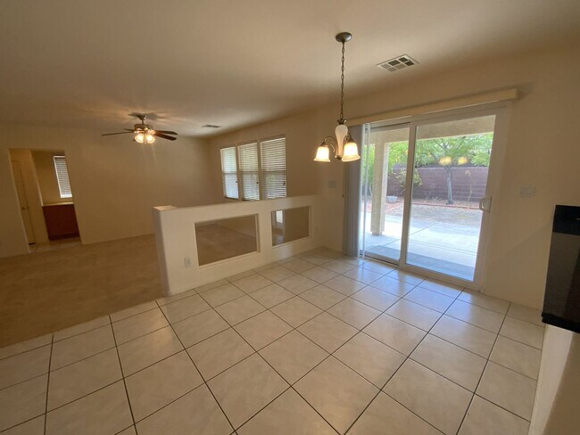 Building Photo - 4 bedrooms and 2.5 bathrooms 2-story home located in Henderson, NV!