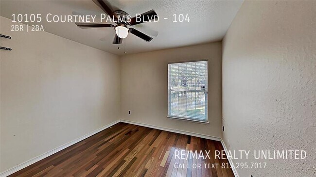 Building Photo - 10105 Courtney Palms Blvd