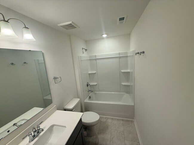 Building Photo - Brand New Townhome in Highland Creek Area!