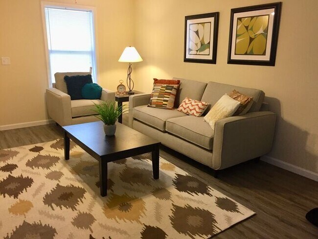 Building Photo - Settle in and cozy up in this comfortable lower-level two-bedroom apartment.