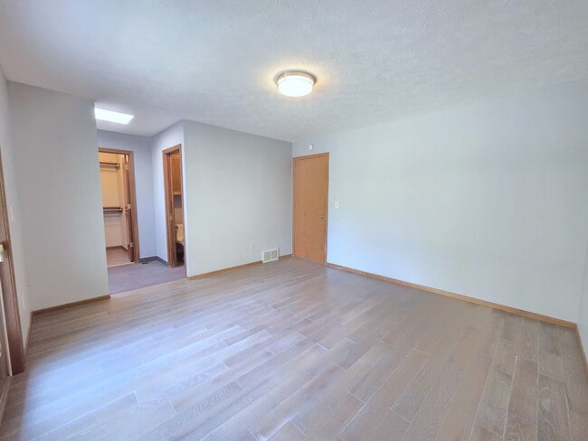 Building Photo - 3425 E 61st Ave