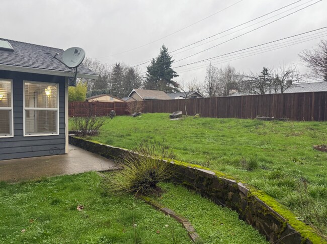 Building Photo - Charming 3 Bedroom with a Living Room, Sun Room,Huge Fenced Yard & More!