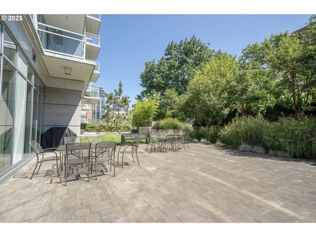 Building Photo - Modern 2-Bed/2-Bath Condo with Balcony & Prime Downtown Location