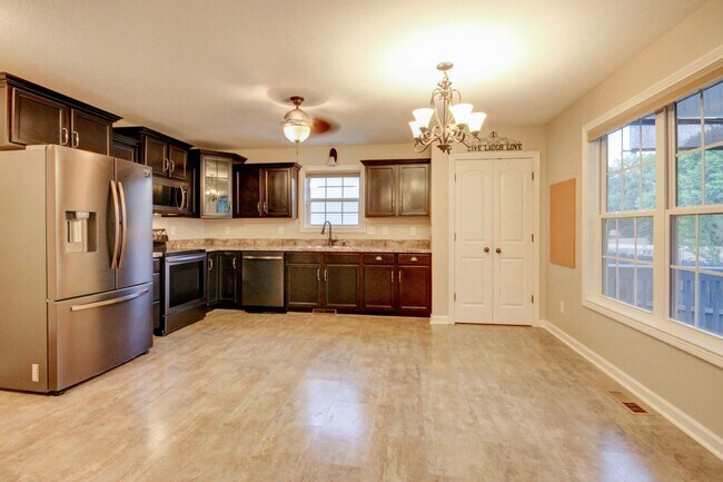 Building Photo - Stunning Brick Front Home With Fireplace A...