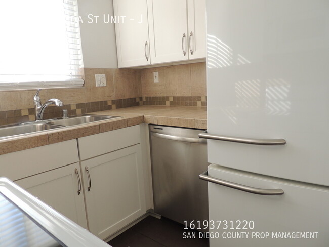 Building Photo - Charming North Park Condo - Your Urban Oas...