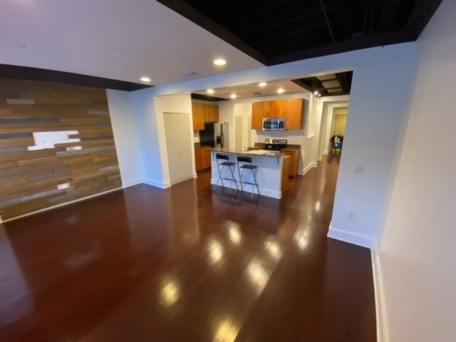 Living room and open kitchen - 62 West Colonial Drive