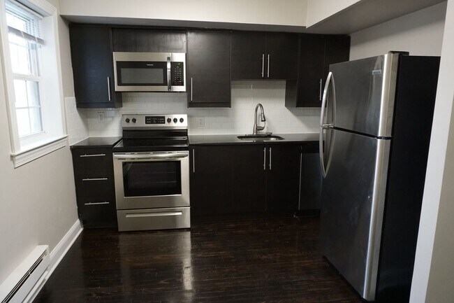 Building Photo - 210 Trinity Ave