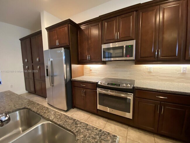 Building Photo - 9823 W 34th Ln