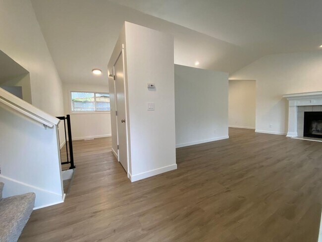 Building Photo - Stylishly Renovated Home with Private Back...