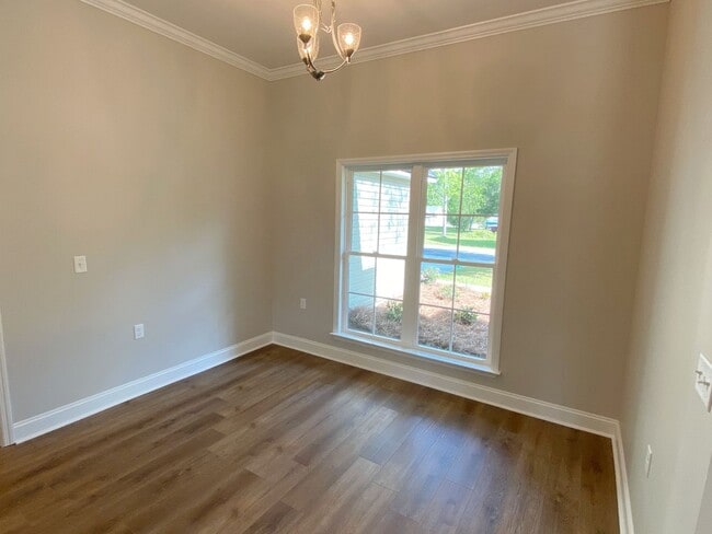 Building Photo - $500 Move-in Discount! Modern 4-Bedroom Home with Fenced Yard Near Moody AFB