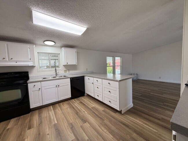 Building Photo - Welcome to Buxton Place – A Hidden Gem in Troutdale Offering Comfortable Homes, a Strong Sense of...