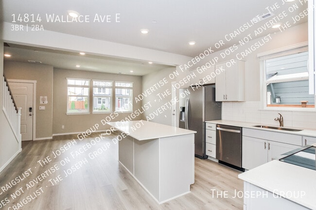 Building Photo - 14814 Wallace Ave E