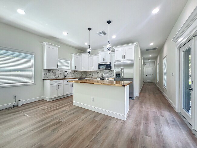 Building Photo - BRAND NEW CONSTRUCTION in the Heart of Pla...