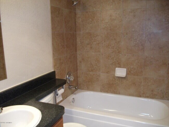 Building Photo - Effortless Central Tucson Living: 2BR Gem with Water/ Sewer/ Trash Included