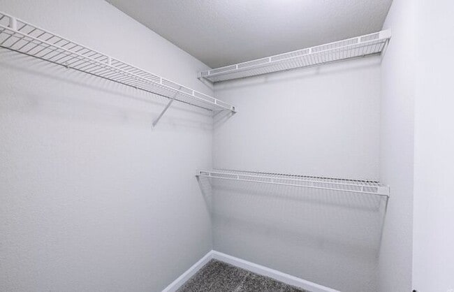 Building Photo - Spacious 2-Bedroom Elite Apartment with Private Balconies & Washer/Dryer