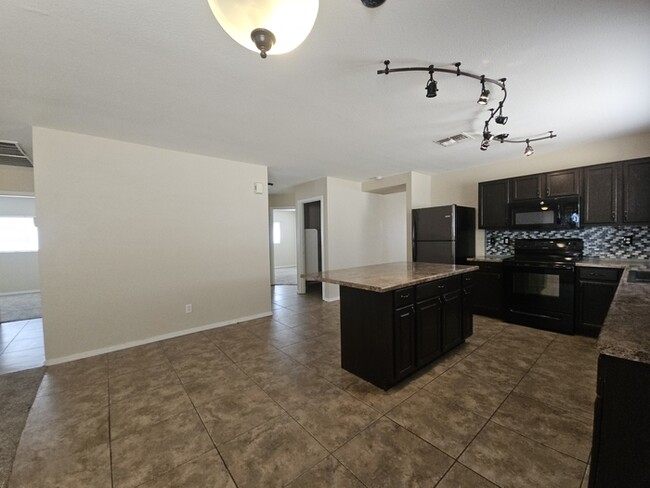 Building Photo - 8547 E Lobo Ave