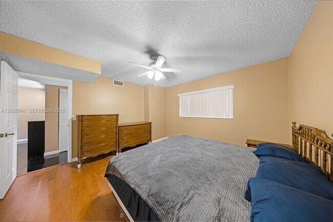 Building Photo - 6075 N Sabal Palm Blvd
