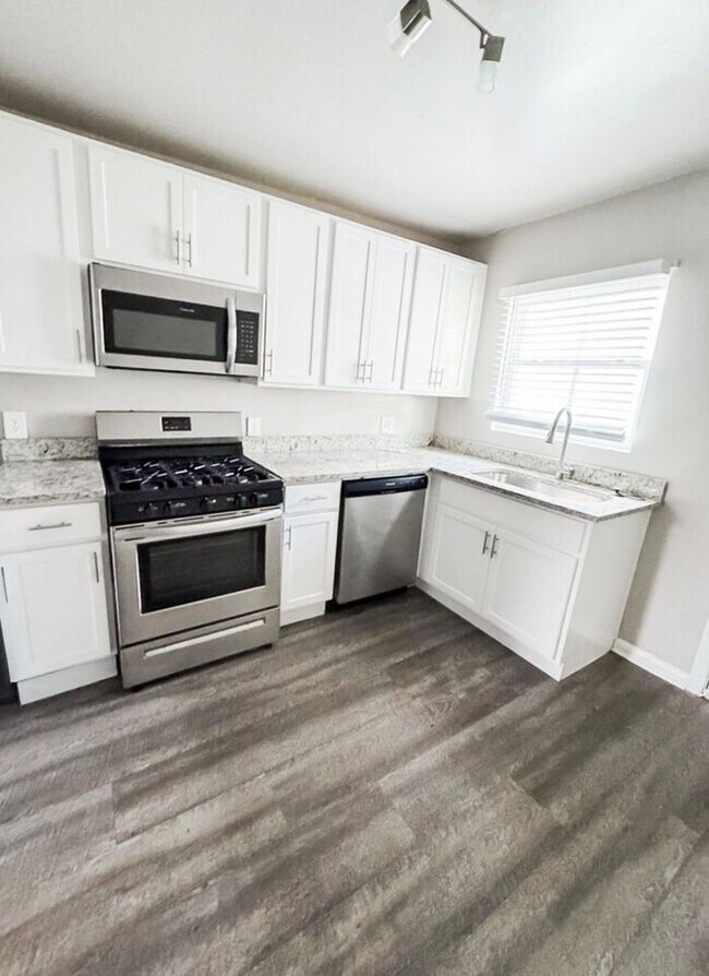 Building Photo - Second-Floor 2-Bedroom Premium Apartment | 850 SF