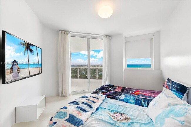 Building Photo - 4779 Collins Ave