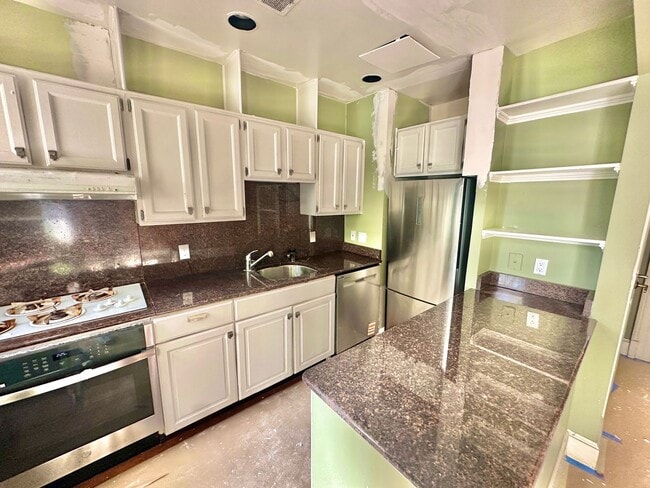 Building Photo - RENOVATION PREVIEW - Astonishing Adams Mor...
