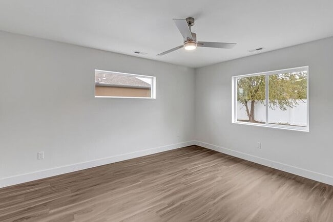 Building Photo - Price Drop! Beautiful 4-Bedroom Rental with Modern Upgrades and RV Parking!