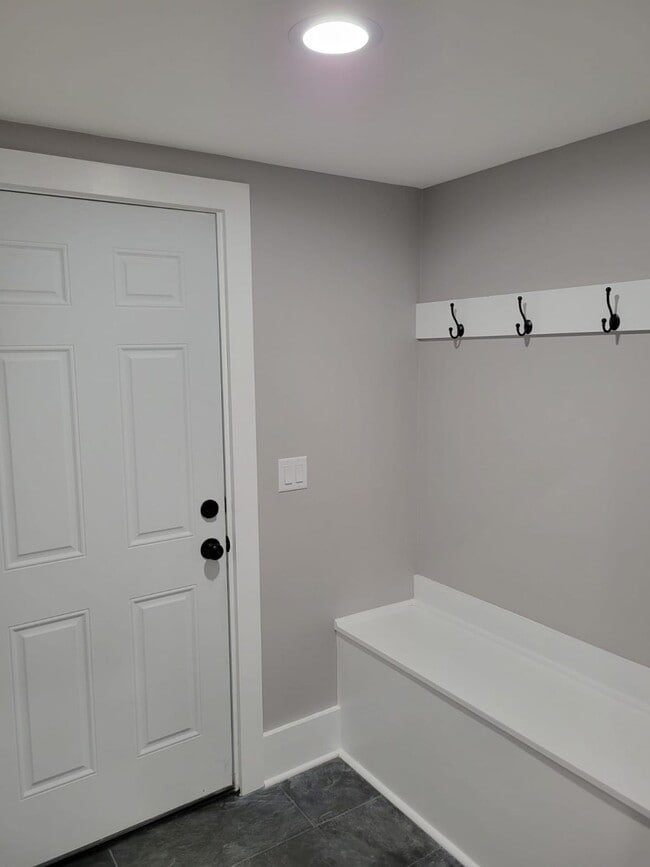 Building Photo - COMING SOON In February 2026  -   Modern, Chic and brand new 2 bedroom with an office.  Discover ...