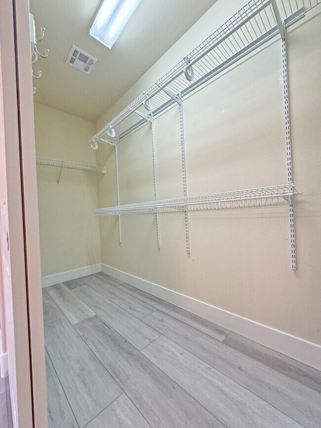 Building Photo - Vaulted Ceiling single-story home in a gat...