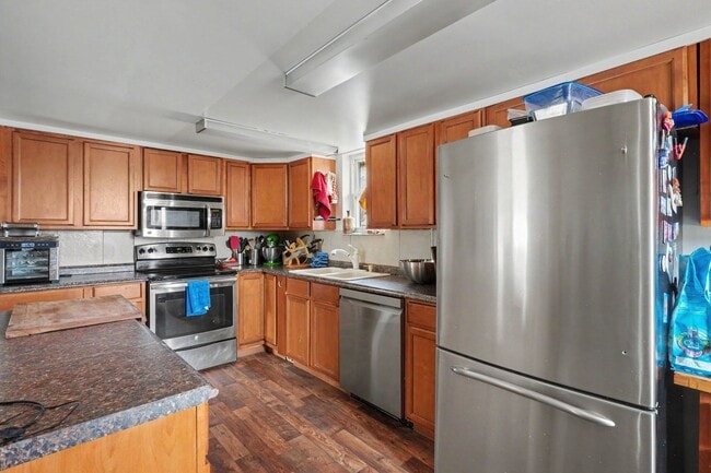 Building Photo - Spacious 3BR Ranch on Large Corner Lot with 2-Car Garage