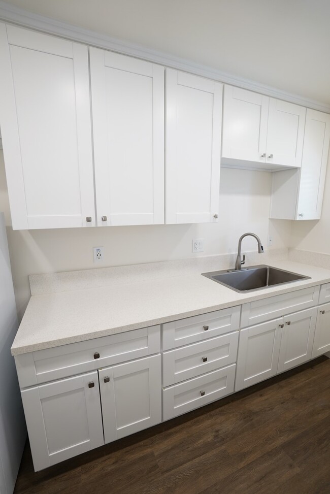 Kitchen Cabinets & Countertop - Villa Primavera Apartments