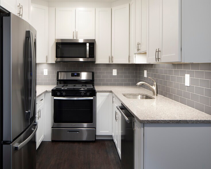 Primary Photo - The Cornerstone: Heat, Gas, Hot & Cold Water Included, Elevator, Cat & Dog Friendly