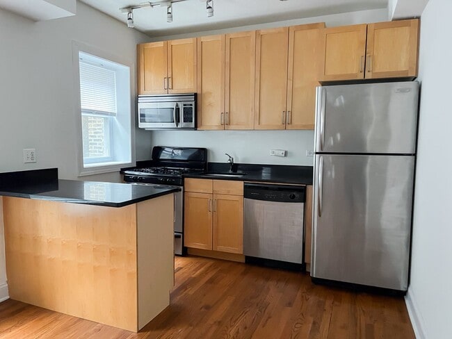 Building Photo - Uptown - 2 Bed / 2 Bath - Central Heat & AC