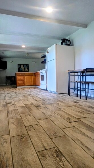 Tiled kitchen with full range/oven and double sink - 1135 E Santa Maria Dr