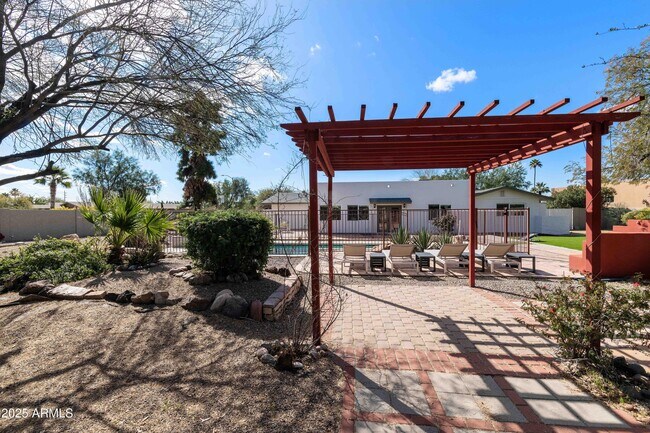 Building Photo - 7074 E Aster Dr
