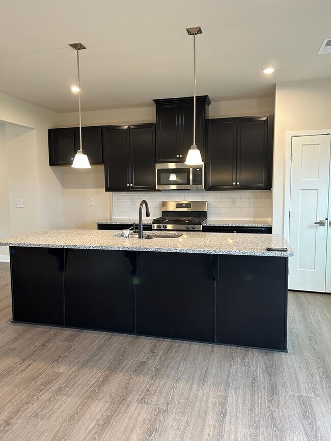 Building Photo - Three-Story Townhome