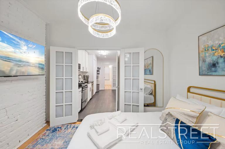 Building Photo - Modern 1BR/1BA in Prime Lower Manhattan | Fast Access to Midtown & Google HQ