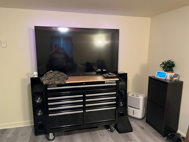 Building Photo - Affordable Apartment Outside the City Limits