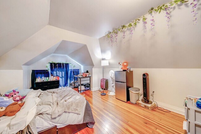 Building Photo - Charming 5-Bedroom Home with Exposed Brick and Modern Upgrades