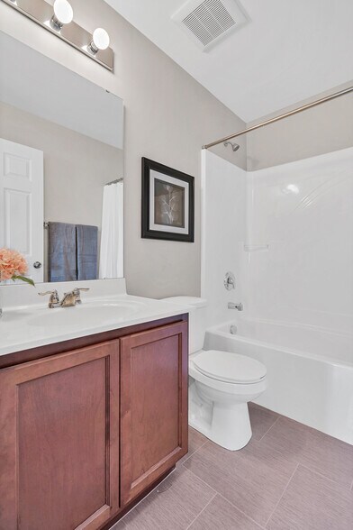 Second bath with tile flooring - 201 Countryshire Dr