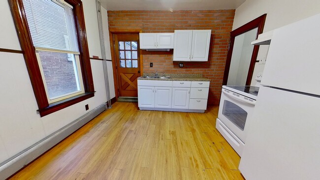 Building Photo - Second-Floor Apartment with Off-Street Parking - MOVE IN SPECIAL