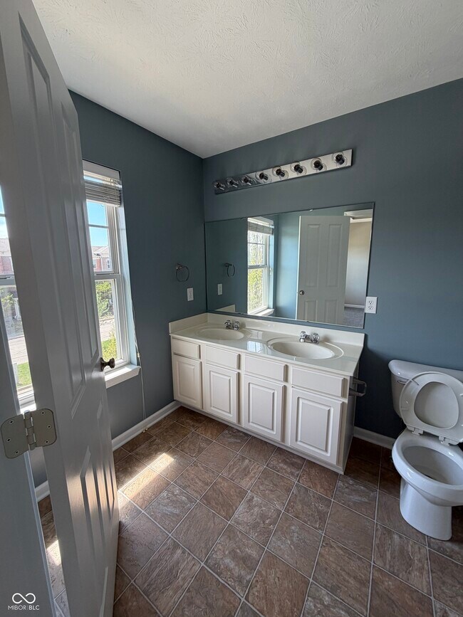 Building Photo - 6305 Schooler Drive