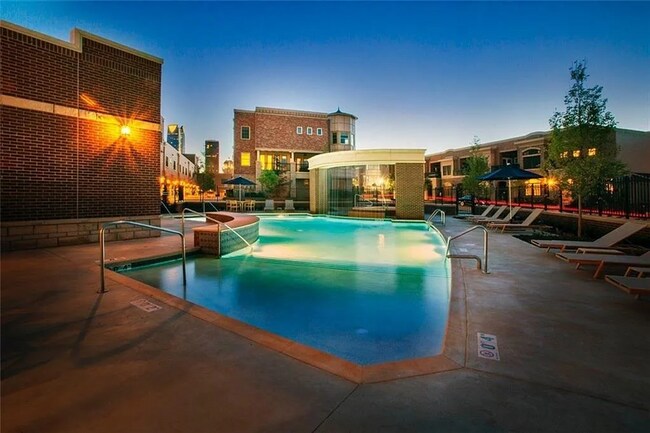 Building Photo - **Stylish Downtown Condo at The Hill – Wal...