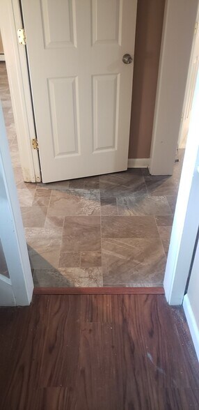 Entryway new floor - 5 Tudor Ct W