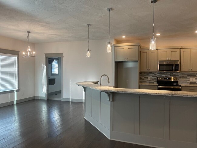 Building Photo - All Brick, 3 bedrooms AND 3 car garage