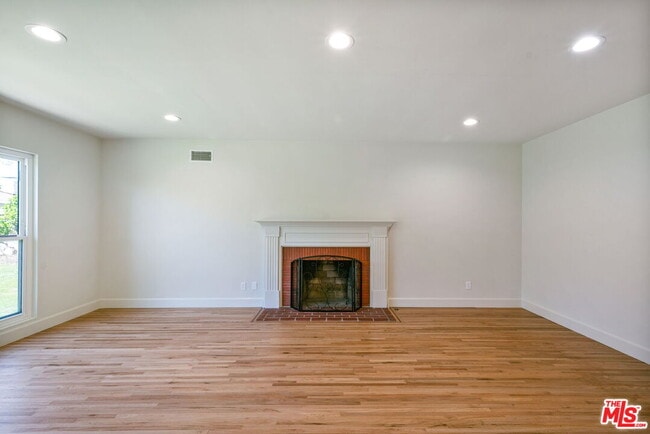 Building Photo - 5911 S Corning Ave