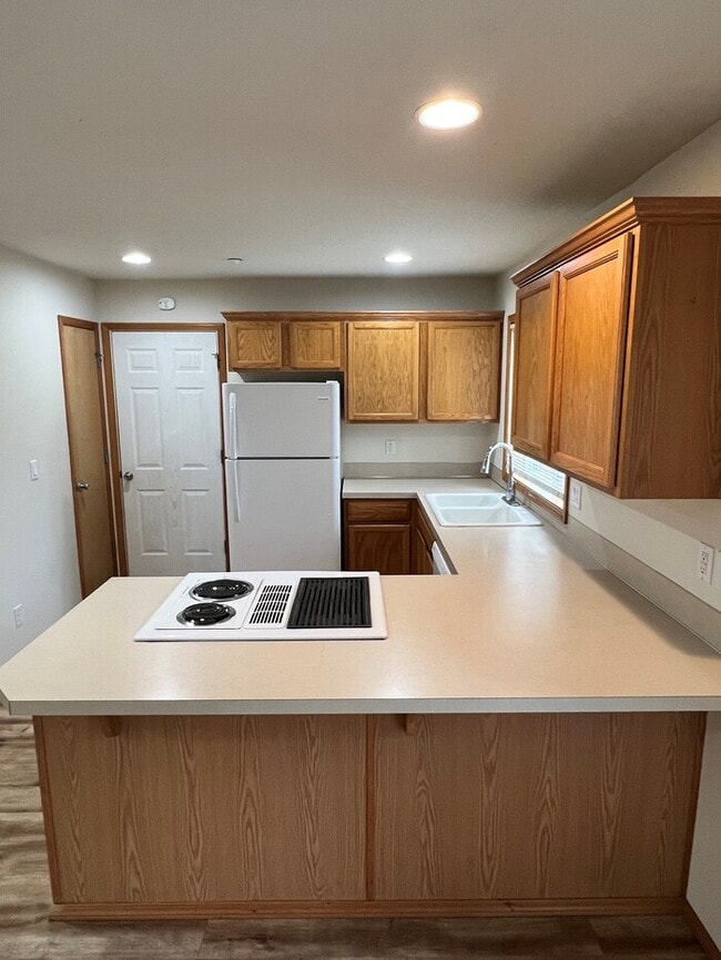 Building Photo - Beautiful Home with LVP Flooring, W/D, Garage, Back Yard, and MORE!