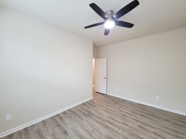 Building Photo - Welcome to this charming one-story home fe...
