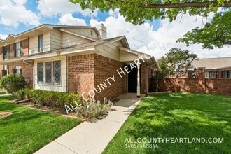 Building Photo - 9009 N May Ave