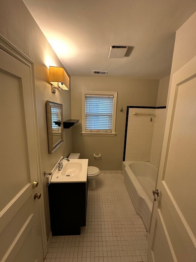 Building Photo - Near Chickasaw Gardens! Split bedroom floor plan! Huge fenced in back yard!