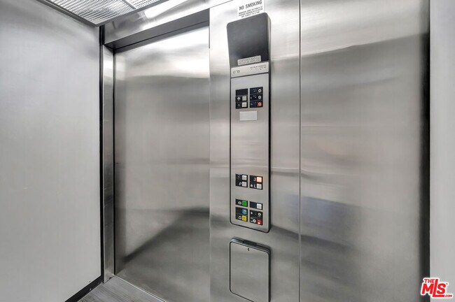 Building Photo - 4477 Woodman Ave